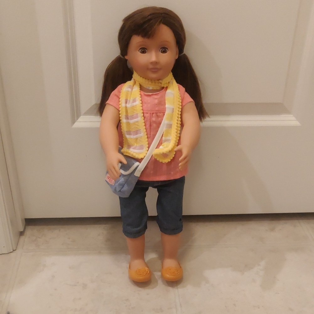 Our Generation Brunette 18" Doll with Pink Shirt and Yellow Scarf.